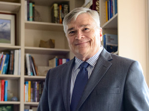 President Barron in his office